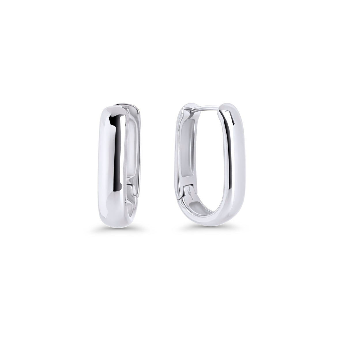 Silver stainless steel oval hoop earrings with smooth minimalist design, hypoallergenic earrings for sensitive ears, tarnish-resistant durable everyday jewelry, modern affordable luxury jewelry Canada.