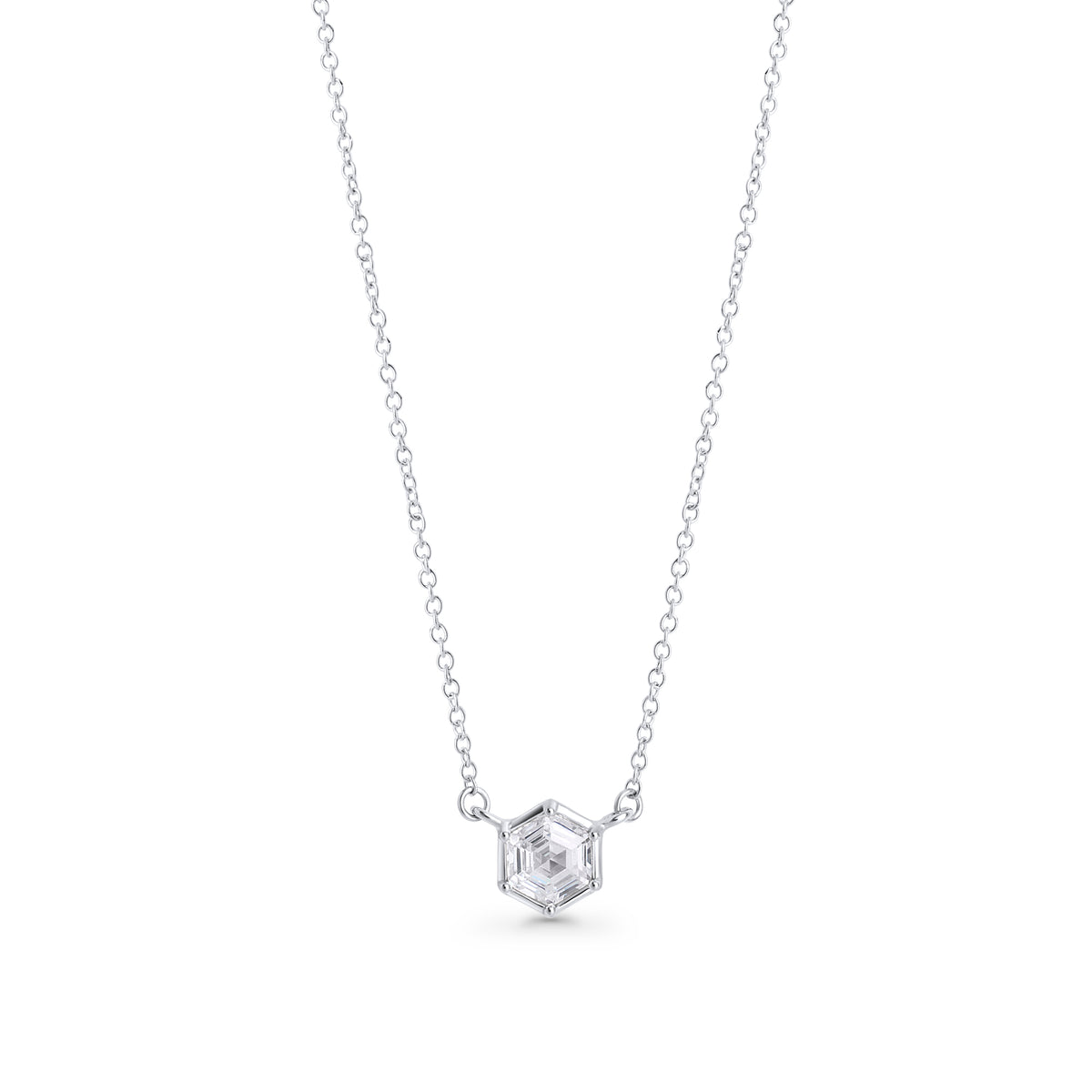 Silver stainless steel necklace with hexagon-cut cubic zirconia pendant, minimalist geometric jewelry design with brilliant stone on delicate chain.