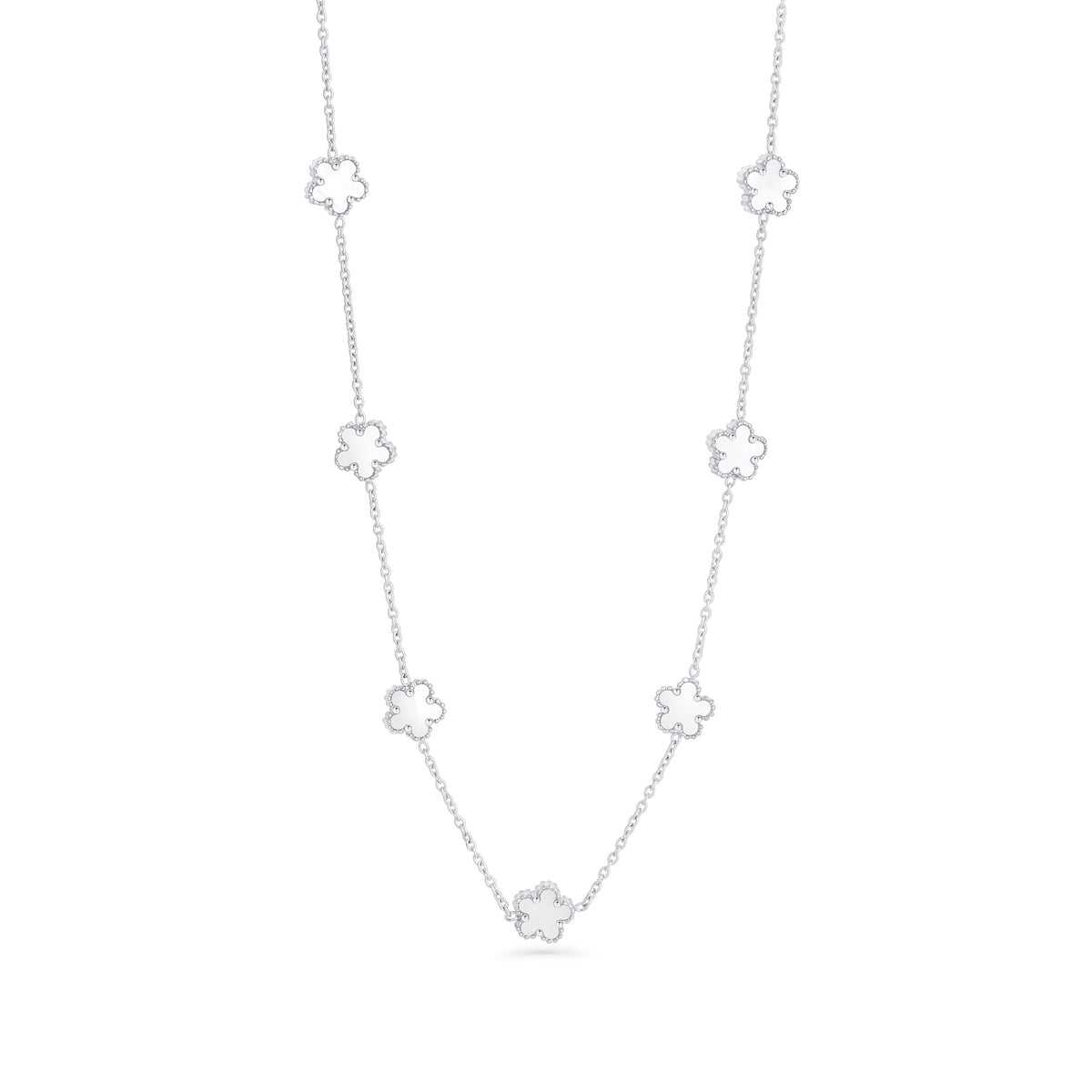 A silver chain necklace with white mother-of-pearl flower charms spaced along the chain, shown on a clean white background. Waterproof, stainless steel and allergy free. By MIAJWL.
Collier à chaîne argentée orné de fleurs blanches nacrées réparties le long de la chaîne, présenté sur fond blanc épuré. Résistant à l'eau, en acier inoxydable et hypoallergénique. Par MIAJWL.