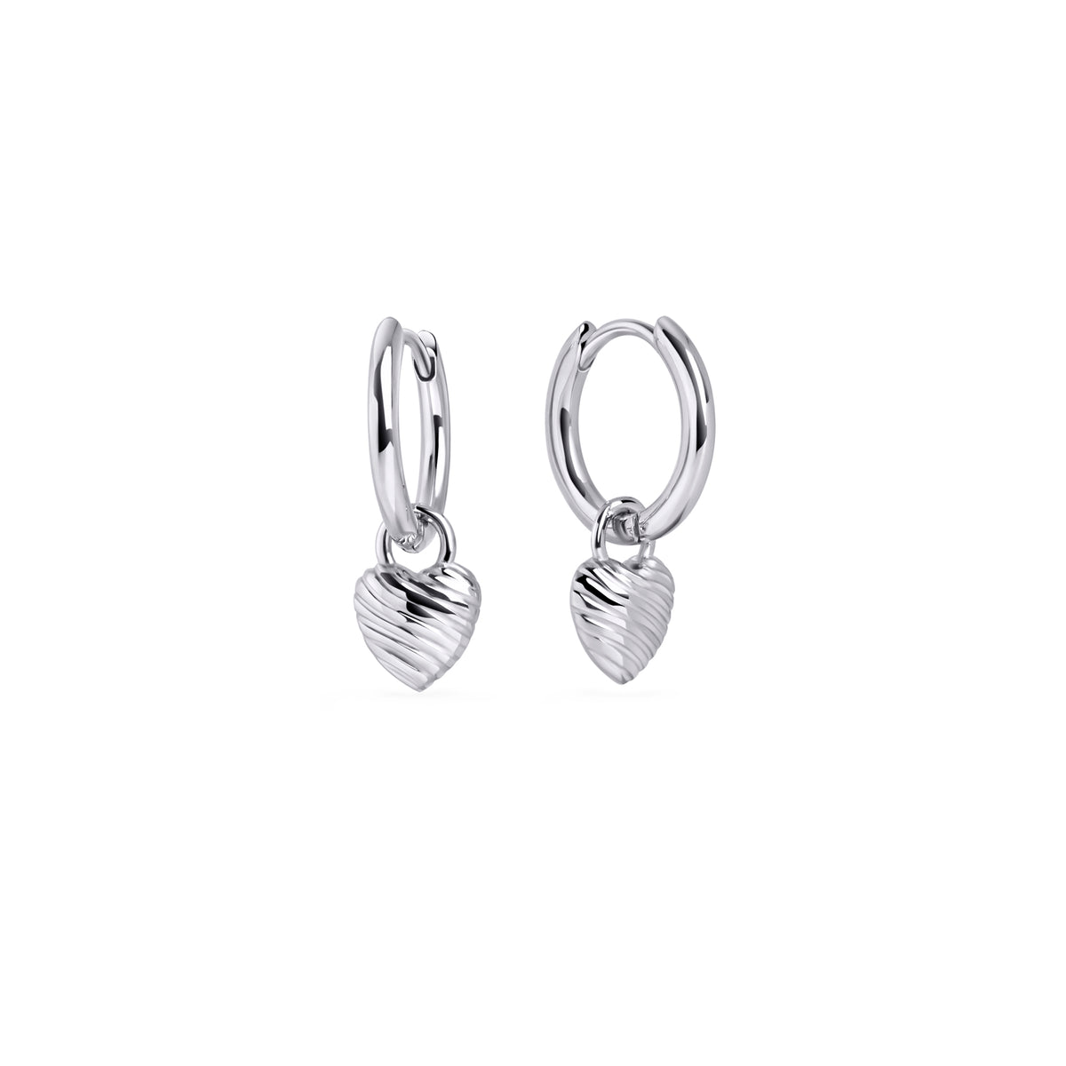 Silver stainless steel hoop earrings with ribbed heart charms, romantic modern jewelry, hypoallergenic non-tarnish durable earrings, elegant everyday fashion jewelry.
