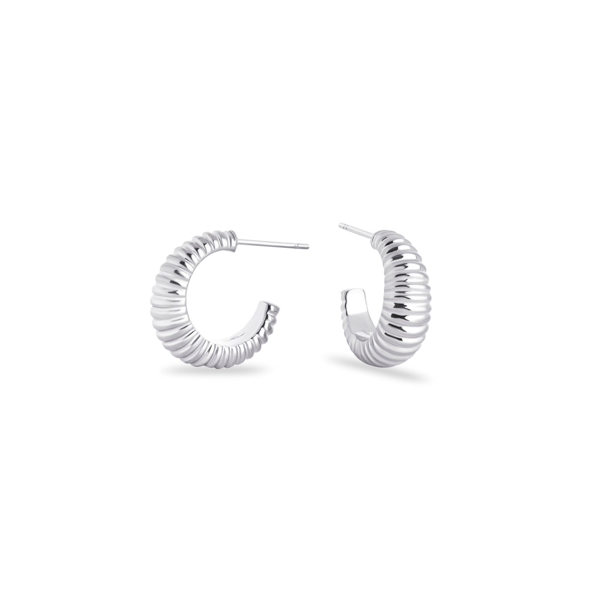 Polished stainless steel hoop earrings with a modern ribbed design for a chic and timeless look. MIAJWL