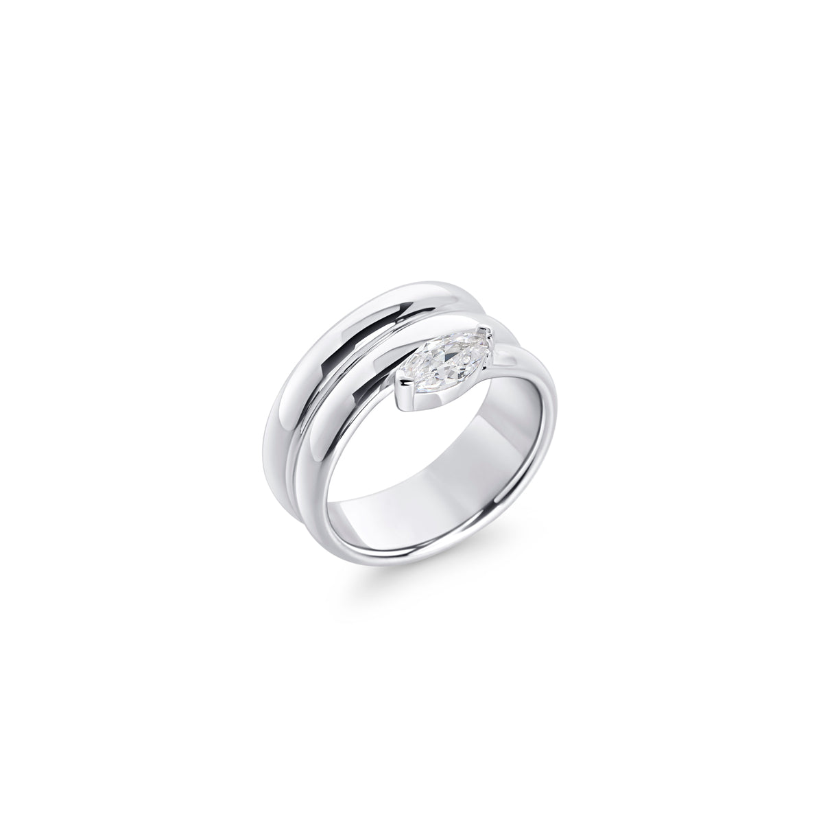 Gold stainless steel statement ring with marquise-cut cubic zirconia, sculptural modern jewelry design, hypoallergenic non-tarnish durable ring, elegant contemporary fashion jewelry.
